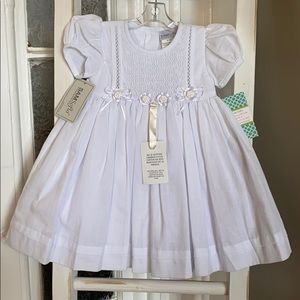 NWT Beautiful smocked special occasion dress